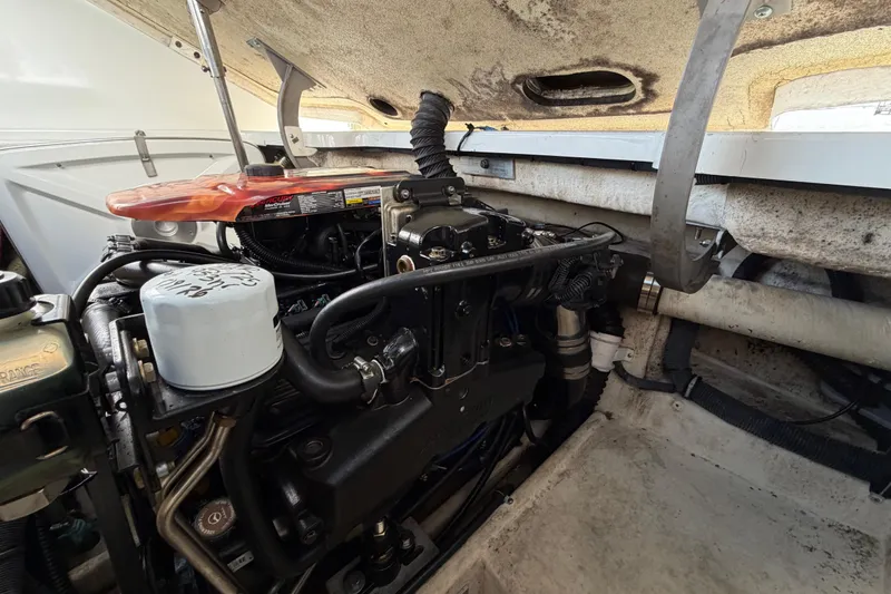 Slide: The Image of 2004 Formula 260 Bowrider engine compartment with visible components and wiring. - 39