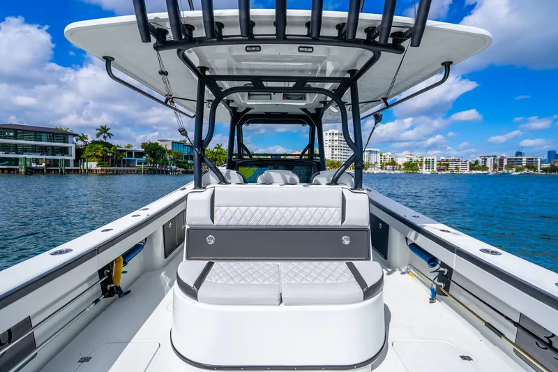 Slide: The Image of 2024 Yellowfin 39 Offshore boat on water, featuring sleek design and modern amenities. - 21