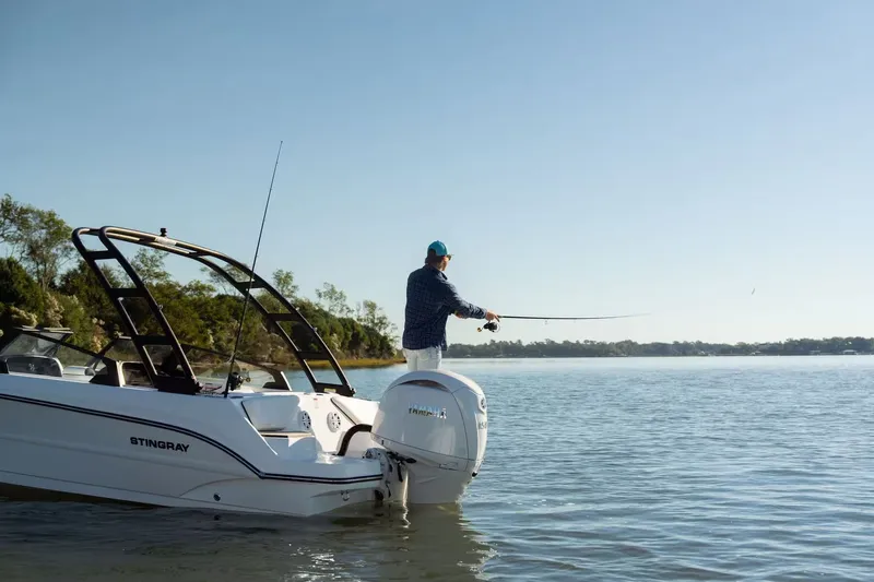 Slide: The Image of Angler on a 2026 Stingray 20 SBX boat fishing. - 5