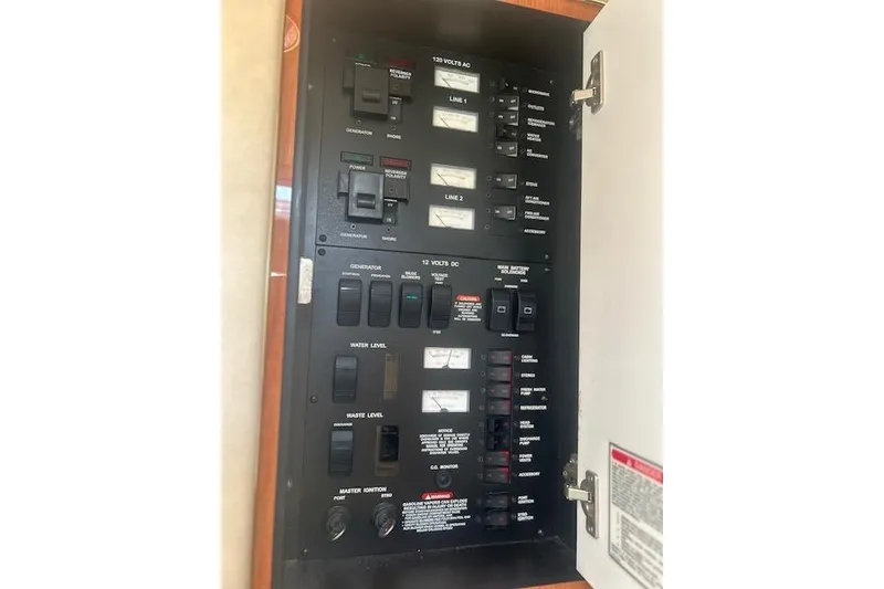 Slide: The Image of Electrical control panel on a 2001 Sea Ray 340 Sundancer boat. - 10