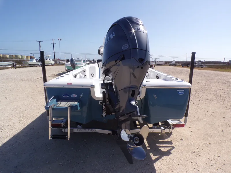 Slide: The Image of Rear view of 2026 Tidewater 2110BMT boat with Yamaha outboard motor. - 9