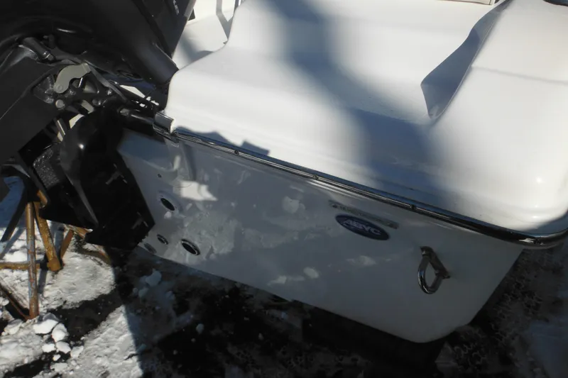 Slide: The Image of 2026 Tidewater 180 CC Adventure boat rear view with snow-covered surface. - 11