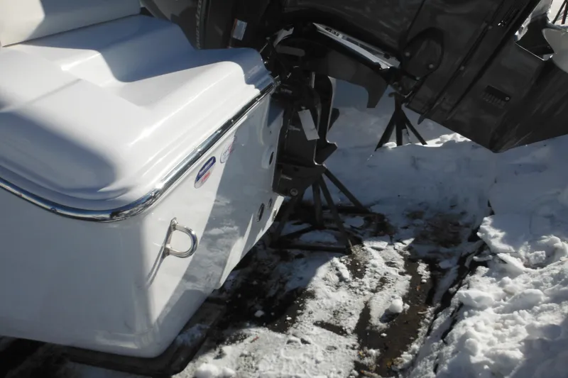 Slide: The Image of 2026 Tidewater 180 CC Adventure boat in snowy setting, showcasing engine and sleek design. - 12