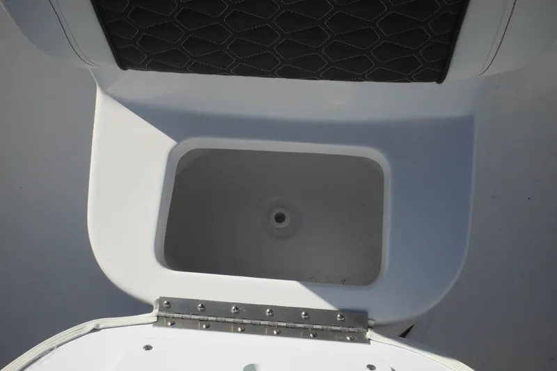 Slide: The Image of Open storage compartment on 2026 Tidewater 180 CC Adventure boat. - 20