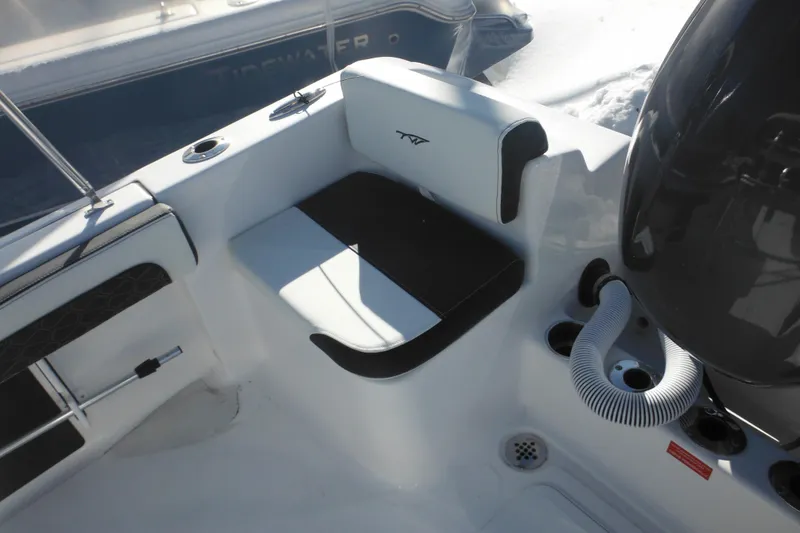 Slide: The Image of 2026 Tidewater 180 CC Adventure boat interior with seating and engine details. - 26