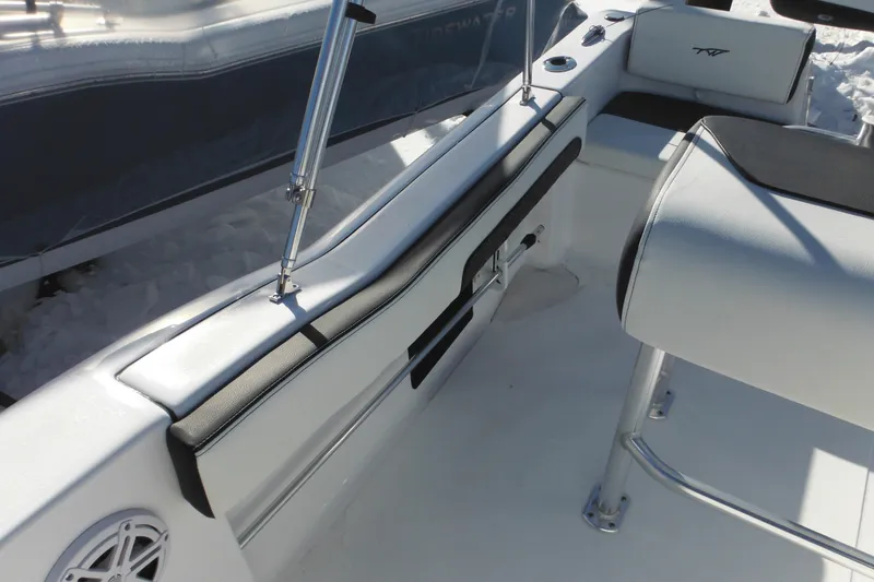 Slide: The Image of 2026 Tidewater 180 CC Adventure boat interior with sleek seating and modern design. - 37