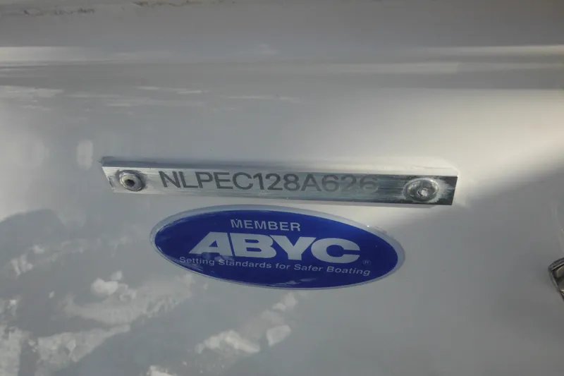 Slide: The Image of 2026 Tidewater 180 CC Adventure boat with ABYC member sticker and serial number. - 8