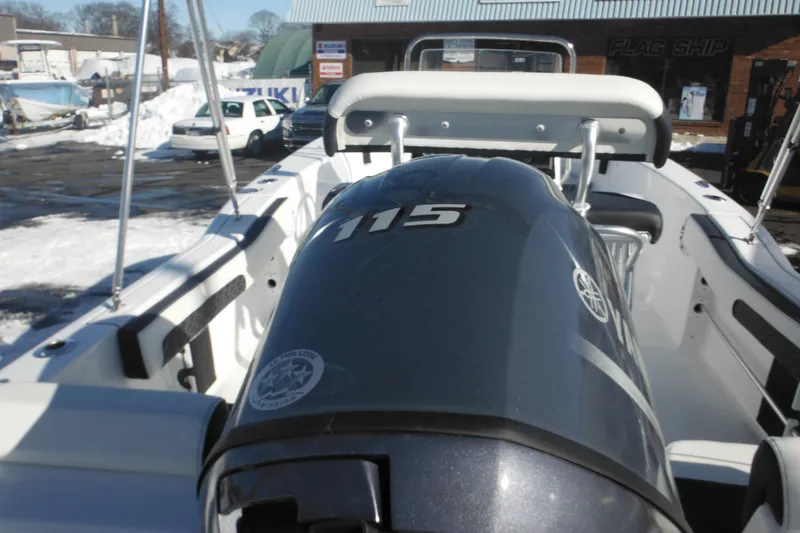 Slide: The Image of 2026 Tidewater 180 CC Adventure boat with Yamaha 115 engine in snowy dealership. - 9
