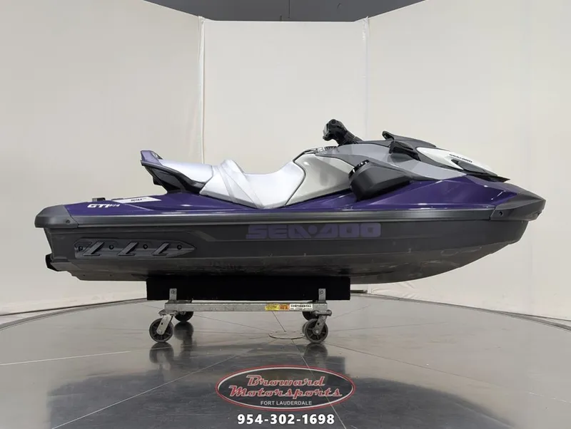 Slide: The Image of 2025 Sea-Doo GTI SE 130 jet ski in purple and gray. - 1