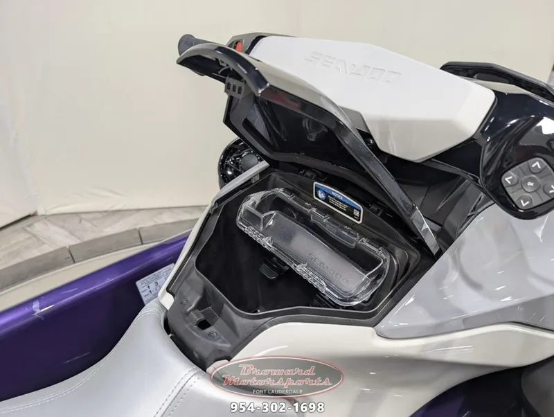 Slide: The Image of 2025 Sea-Doo GTI SE 130 with open storage compartment. - 13