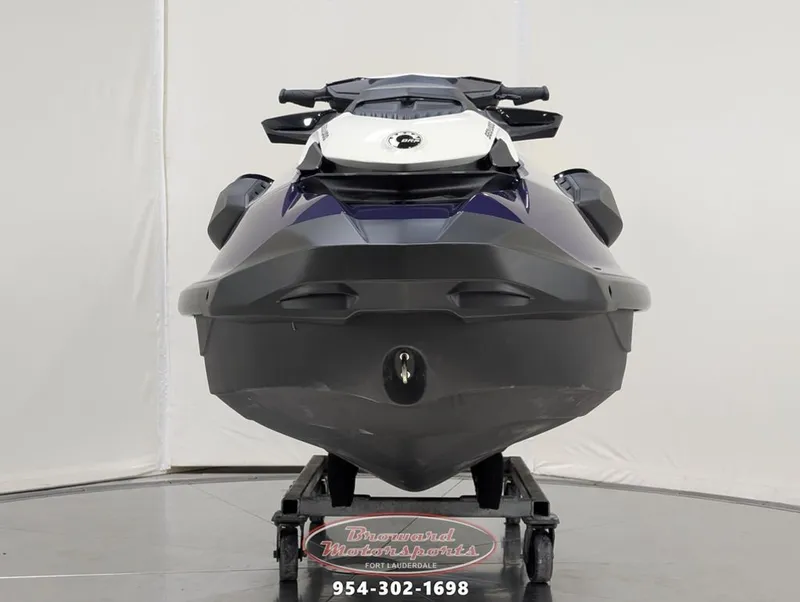 Slide: The Image of 2025 Sea-Doo GTI SE 130 jet ski on display floor. - 2