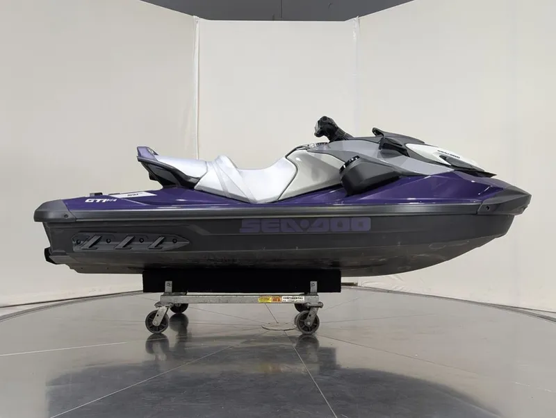 Slide: The Image of 2025 Sea-Doo GTI SE 130 jet ski in purple on a stand. - 30