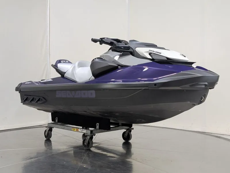 Slide: The Image of 2025 Sea-Doo GTI SE 130 jet ski in purple and gray. - 31