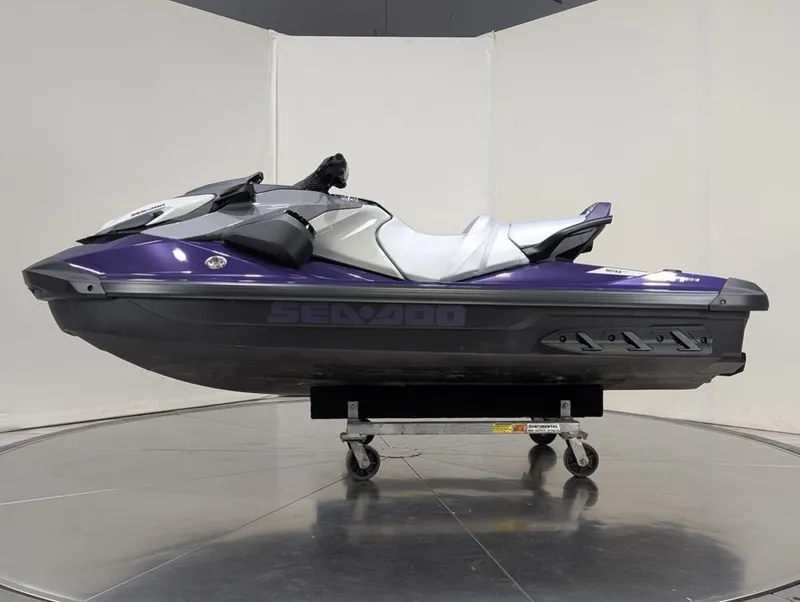 Slide: The Image of 2025 Sea-Doo GTI SE 130 jet ski in purple on display platform. - 33