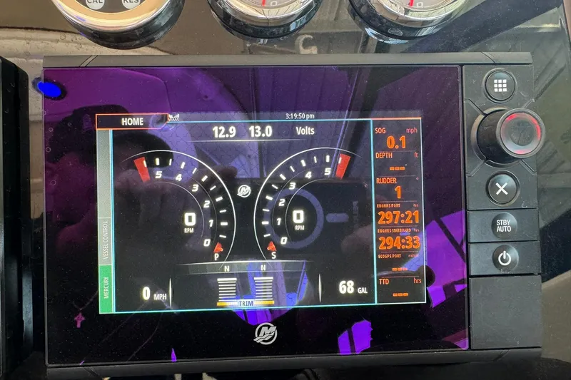Slide: The Image of Dashboard of a 2018 Formula 310 Bowrider showing gauges and digital display. - 24