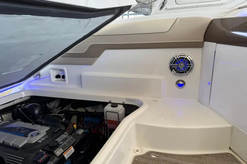 Slide: The Image of 2018 Formula 310 Bowrider engine compartment with speaker and control panel. - 27