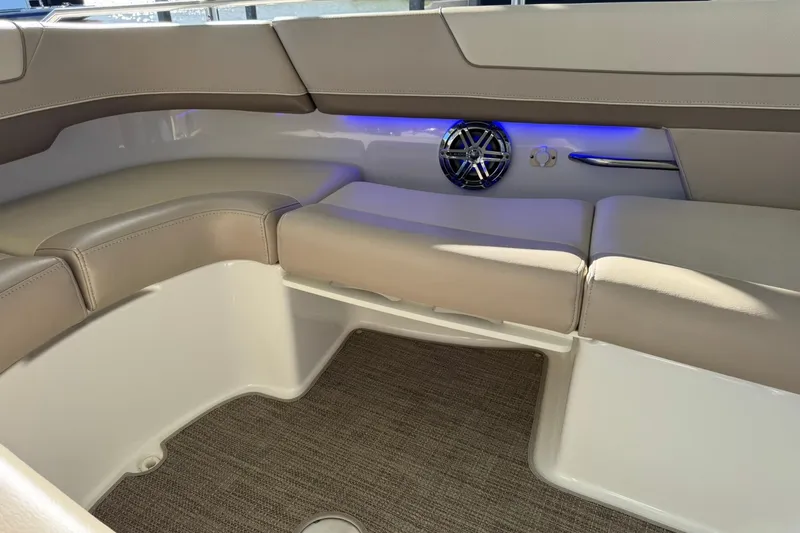 Slide: The Image of 2018 Formula 310 Bowrider interior with beige seating and blue LED lighting. - 38