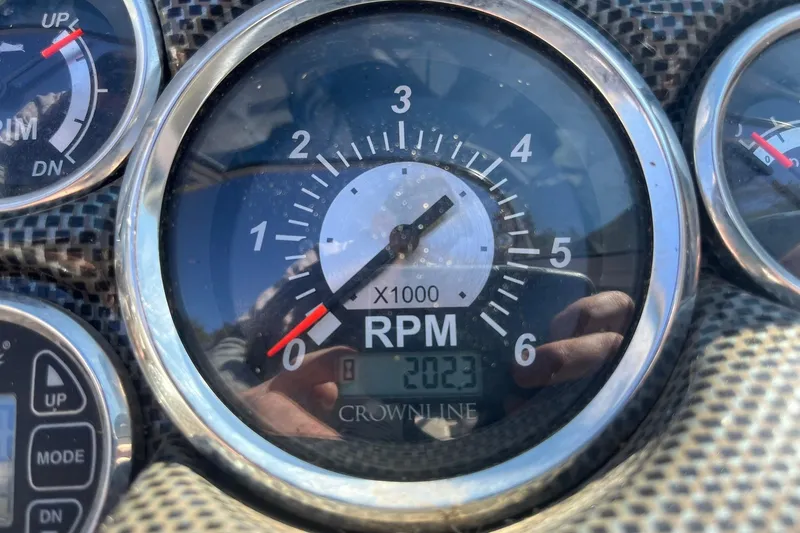 Slide: The Image of Tachometer of 2010 Crownline 210 LS boat showing RPM and digital display. - 9