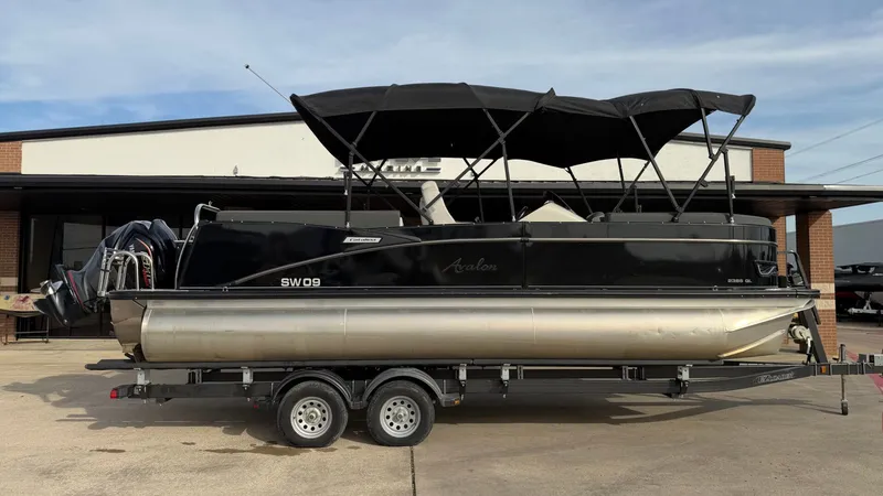 The Image of 2022 Avalon 2385 CAT QL pontoon boat on trailer. - 1