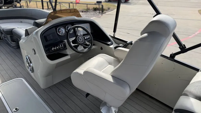 Slide: The Image of Interior of Avalon 2385 CAT QL 2022 boat with steering console. - 11