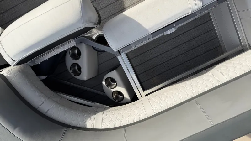 Slide: The Image of Interior of Avalon 2385 CAT QL 2022 with cup holders. - 19