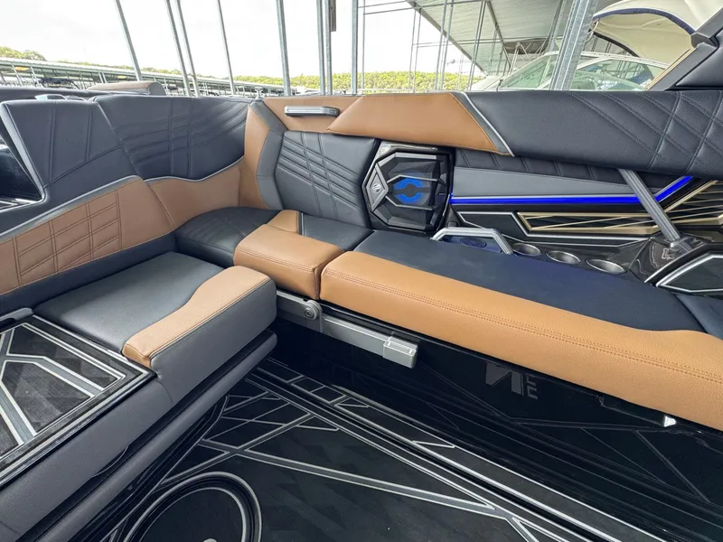 Slide: The Image of Interior of 2025 Tigé Ultré 25ZX with luxurious seating. - 13