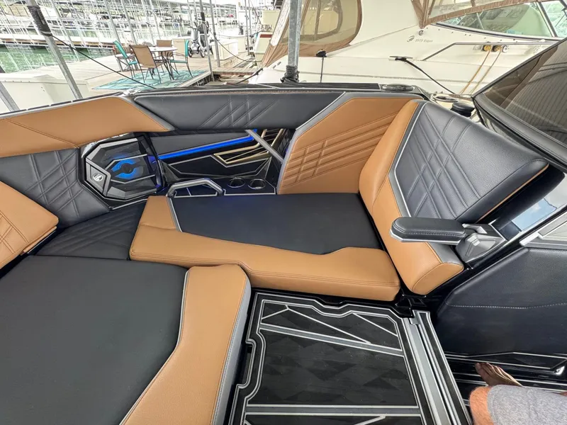 Slide: The Image of Interior of 2025 Tigé Ultré 25ZX with luxurious seating. - 18