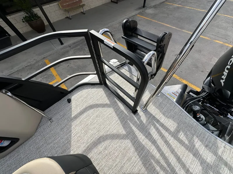 Slide: The Image of Trifecta 22 UL CS 2026 boat with ladder and motor. - 10