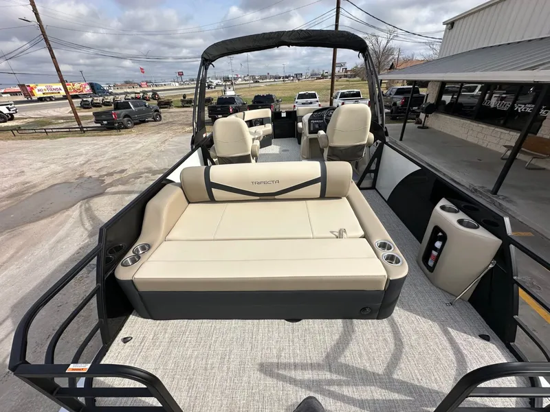 Slide: The Image of 2026 Trifecta 22 UL CS pontoon boat with luxurious seating area. - 13