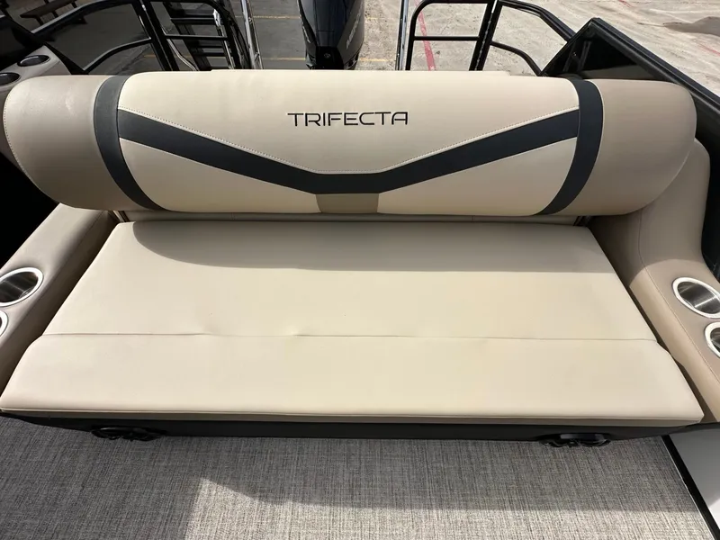 Slide: The Image of Trifecta 22 UL CS 2026 boat seat with cup holders. - 21