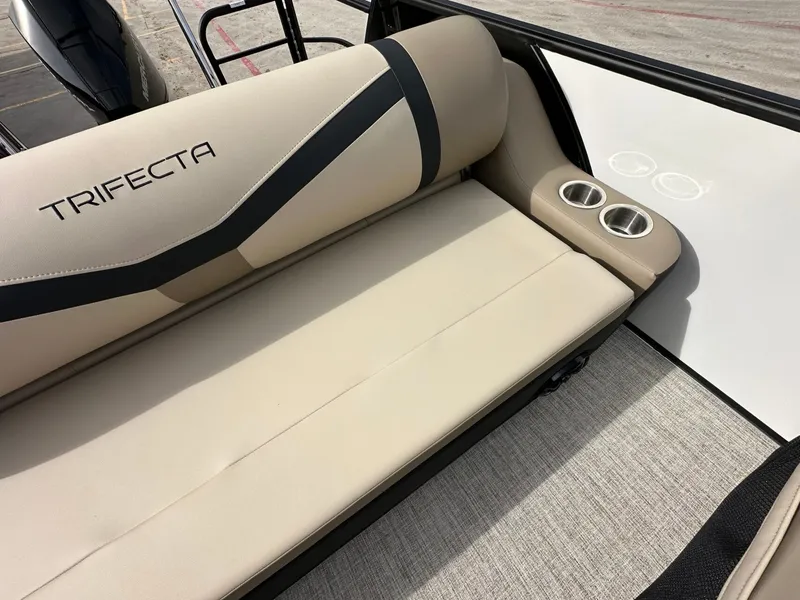Slide: The Image of Trifecta 22 UL CS 2026 boat seat with cup holders. - 22