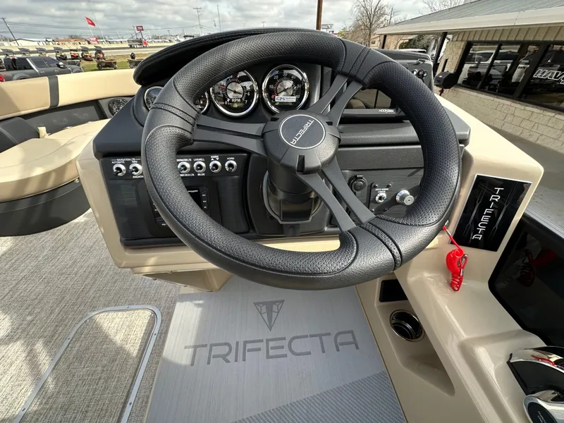 Slide: The Image of Steering wheel of Trifecta 22 UL CS 2026 with dashboard. - 33