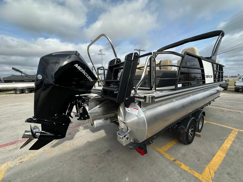 Slide: The Image of Trifecta 22 UL CS 2026 pontoon boat with Mercury engine. - 5