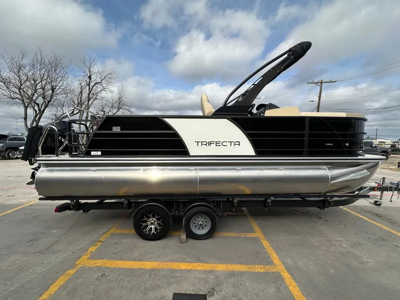 Slide: The Image of 2026 Trifecta 22 UL CS pontoon boat on trailer. - 6
