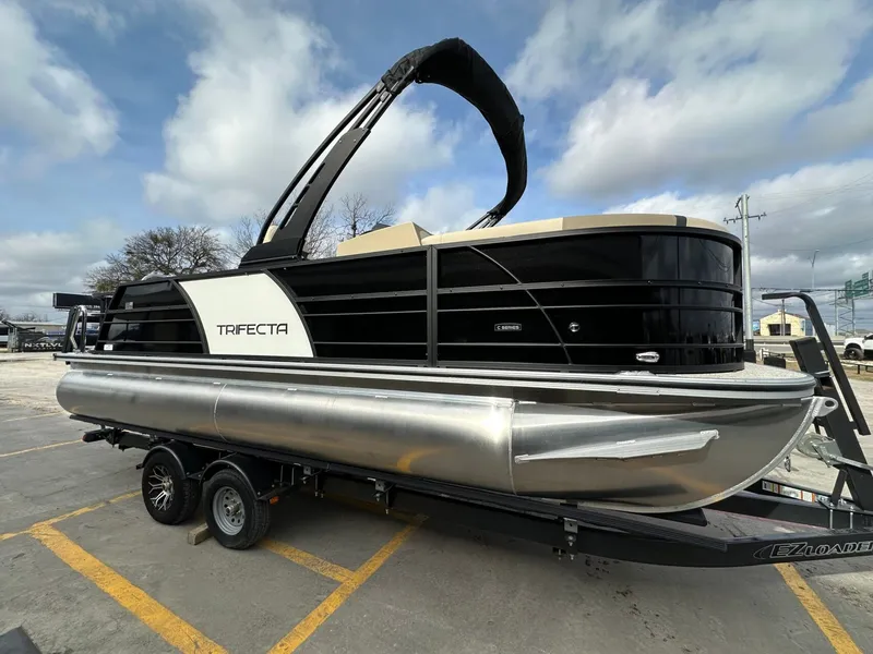 Slide: The Image of 2026 Trifecta 22 UL CS pontoon boat on trailer. - 7
