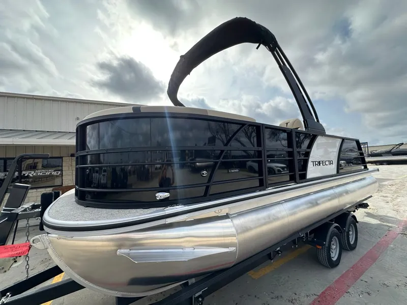Slide: The Image of 2026 Trifecta 22 UL CS pontoon boat on trailer. - 9