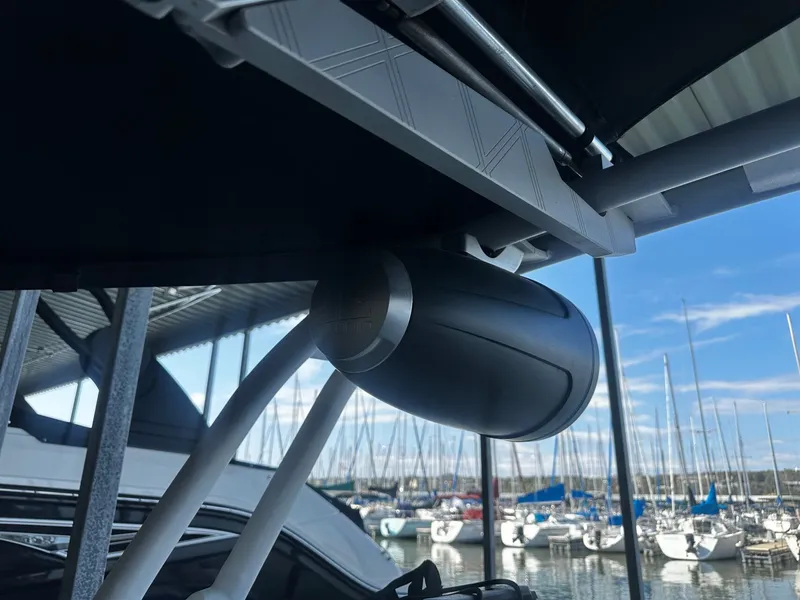 Slide: The Image of Nautique GS24 2021 speaker at marina dock. - 16