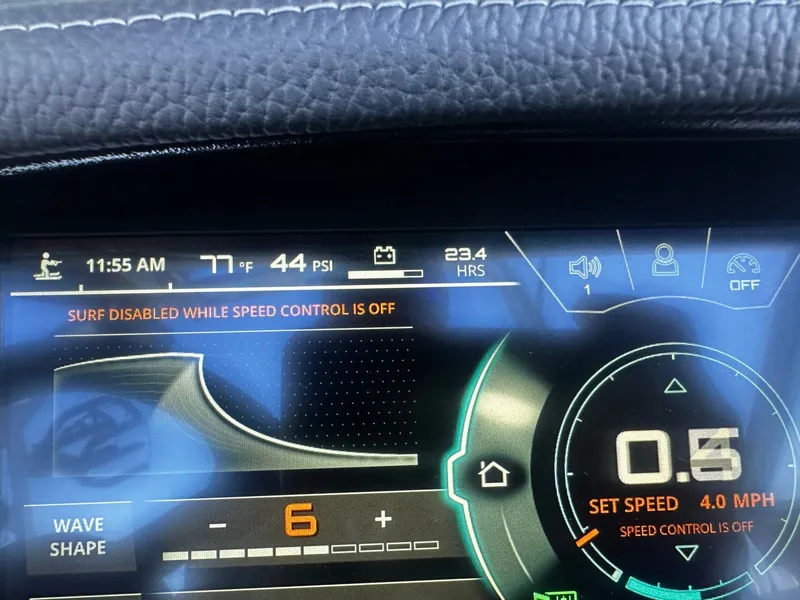Slide: The Image of Nautique GS24 2021 display showing surf and speed control settings. - 19