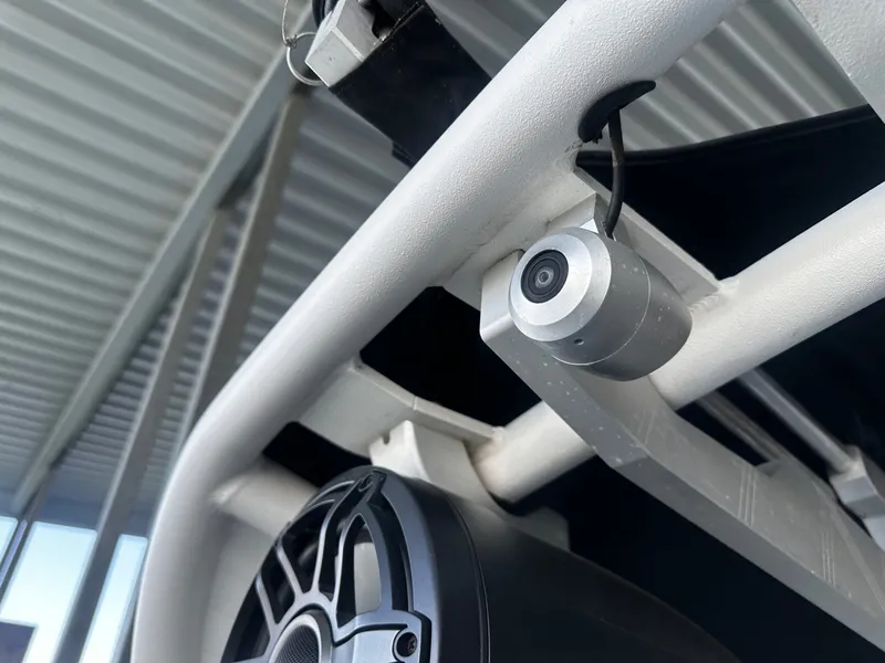 Slide: The Image of Camera and speaker on a 2021 Nautique GS24 boat. - 23