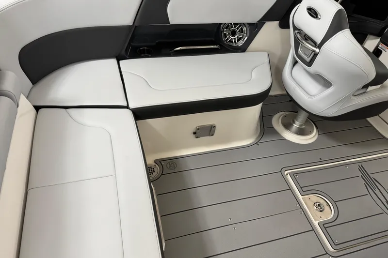 Slide: The Image of 2026 Chaparral 270 OSX boat interior with sleek seating and modern design. - 17