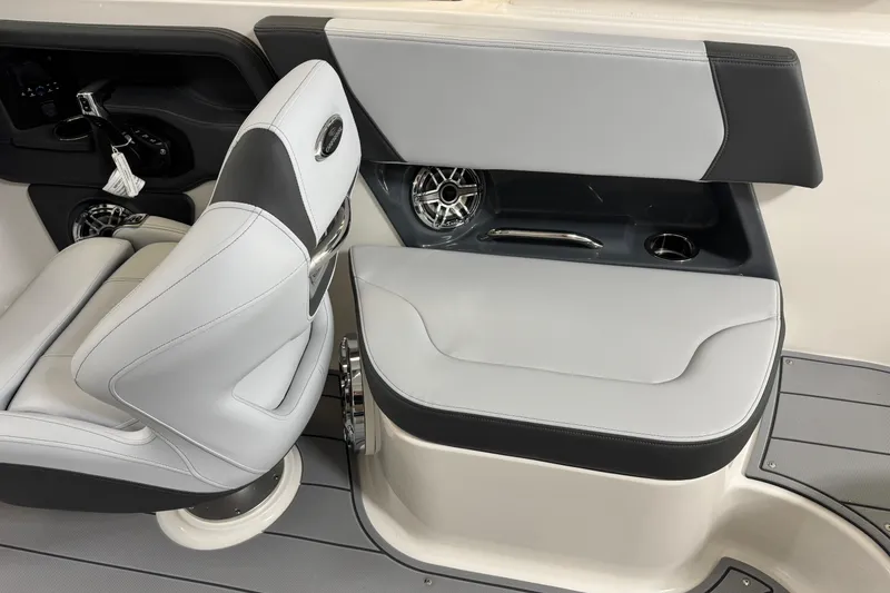 Slide: The Image of 2026 Chaparral 270 OSX boat interior with sleek seating and modern design. - 18