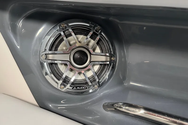 Slide: The Image of JL Audio speaker in 2026 Chaparral 270 OSX boat interior. - 23
