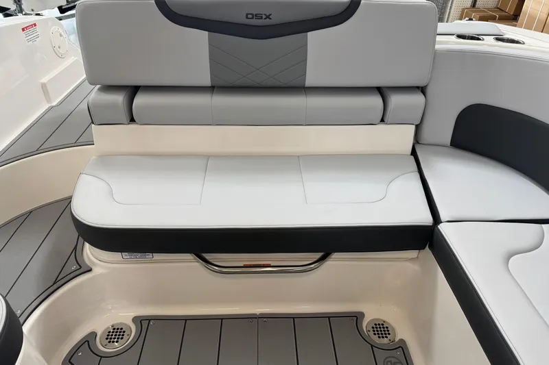 Slide: The Image of 2026 Chaparral 270 OSX boat interior seating with modern design and gray upholstery. - 24