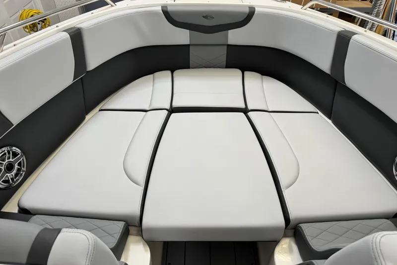 Slide: The Image of 2026 Chaparral 270 OSX boat interior with luxurious seating and modern design. - 31