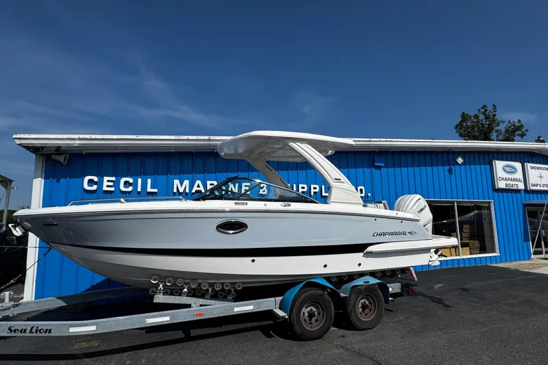 Slide: The Image of 2026 Chaparral 270 OSX boat on trailer outside Cecil Marine building. - 5
