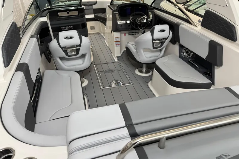 Slide: The Image of 2026 Chaparral 270 OSX boat interior with modern seating and sleek design. - 8