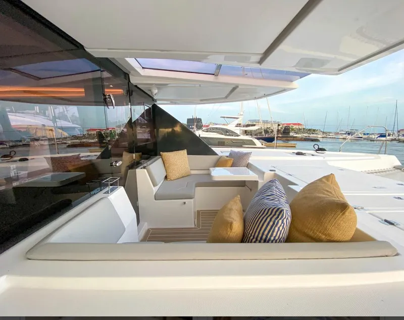 Slide: The Image of Luxurious Leopard 50 yacht deck area with cushions, 2020 model. - 11