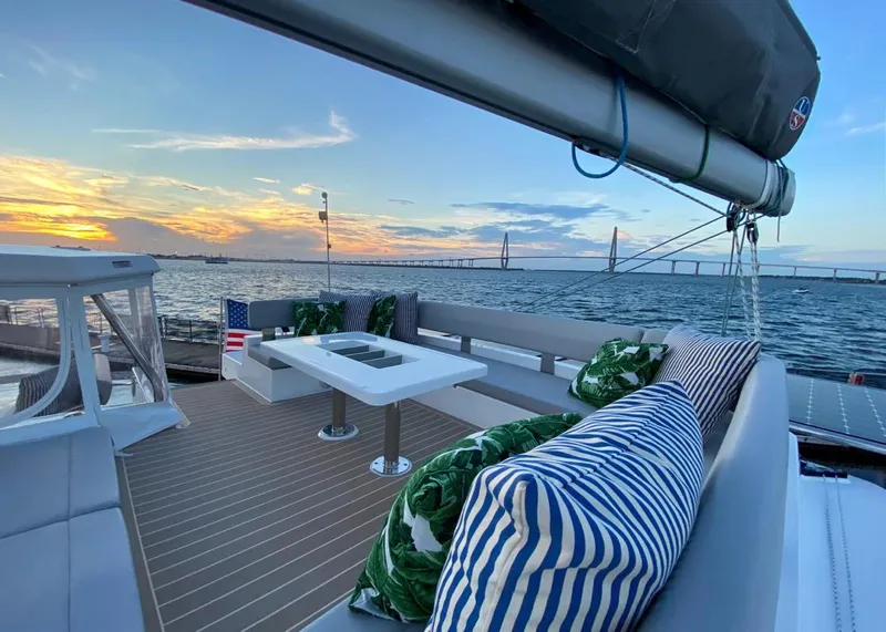 Slide: The Image of Leopard 50 yacht with bridge in background at sunset, 2020 model. - 12