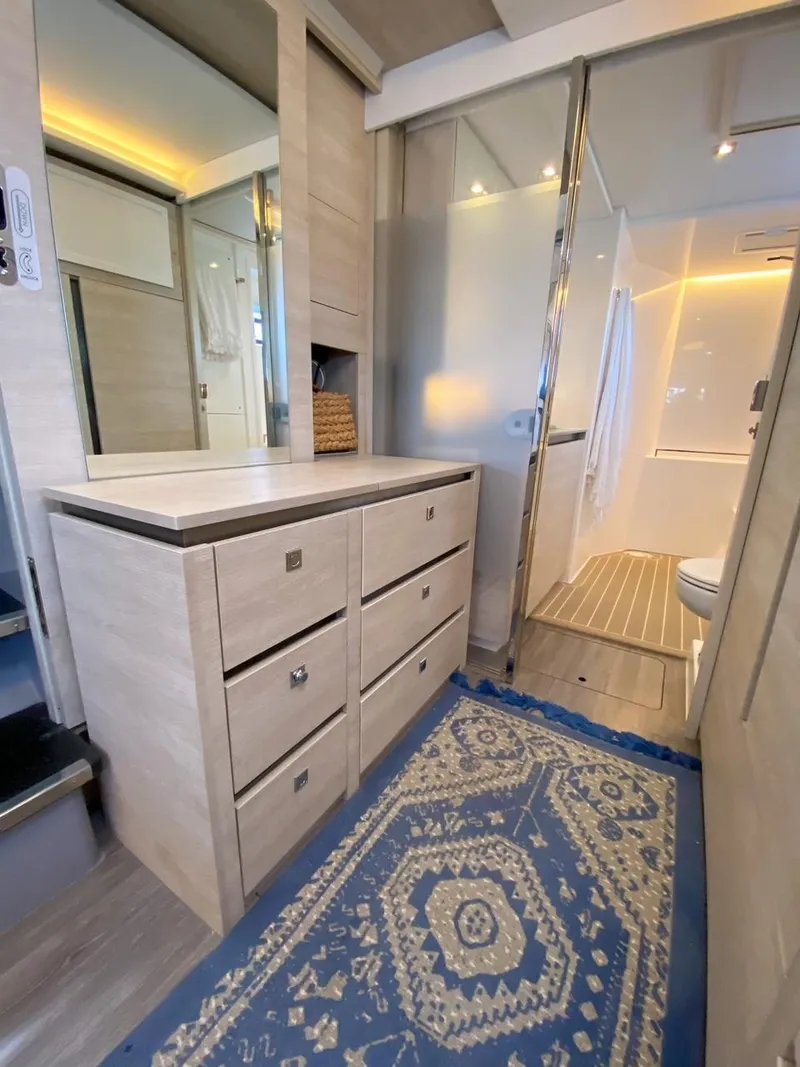Slide: The Image of Leopard 50 yacht bathroom with drawers and rug, year 2020. - 22