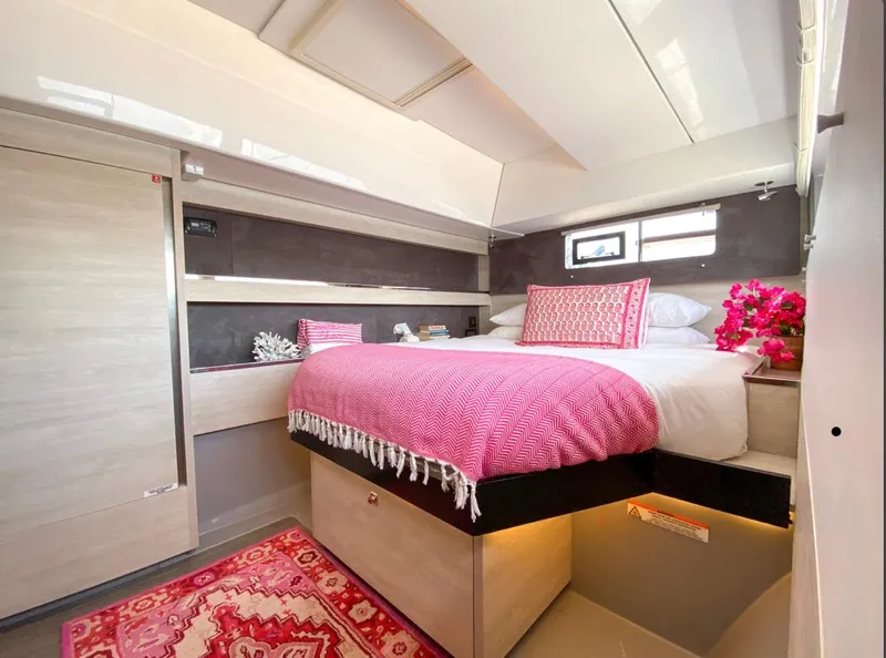 Slide: The Image of Luxurious bedroom on Leopard 50 yacht, 2020 model, with pink accents. - 28